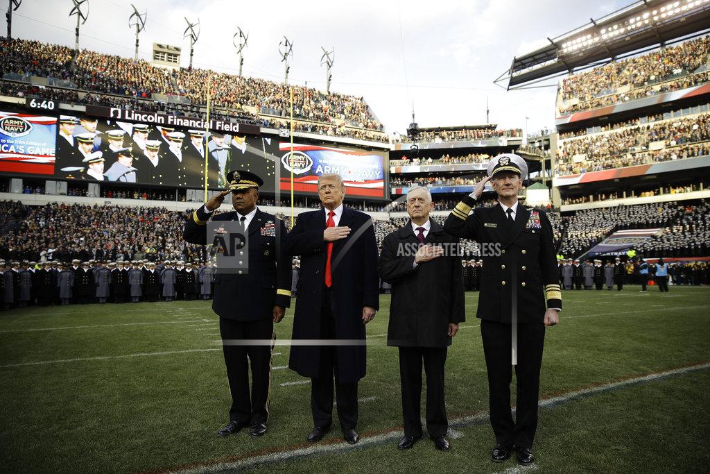Matt Rourke President Donald Trump, center left, and Secretary of Defense Jim Mattis, center right, stand for the national anthem before an NCAA college football between Army and Navy, Saturday, Dec. 8, 2018, in Philadelphia. (AP Photo/Matt Rourke)