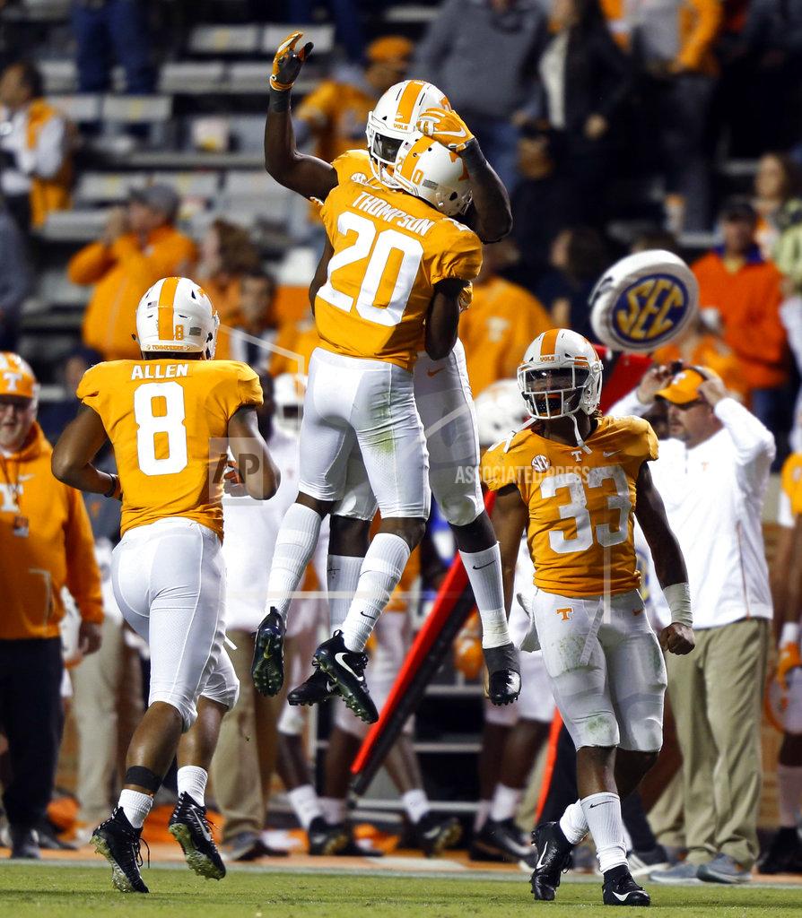 Wade Payne Tennessee defensive back Bryce Thompson (20) celebrates an interception with a teammate in the second half of an NCAA college football game Saturday, Nov. 3, 2018, in Knoxville, Tenn. Tennessee won 14-3. (AP Photo/Wade Payne)