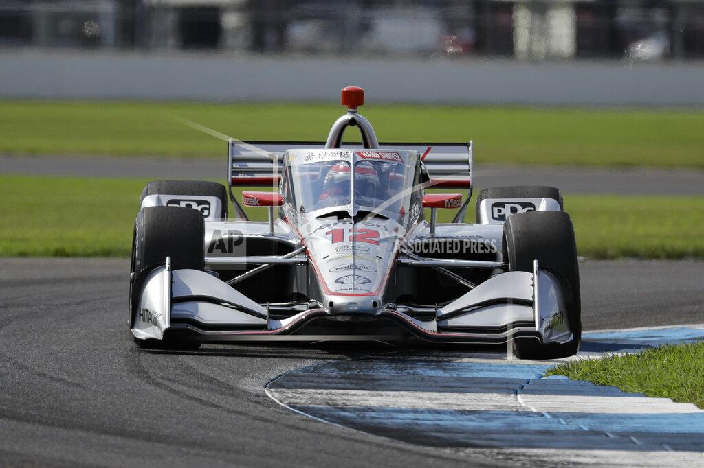 Darron Cummings Race driver Will Power, of Australia, drives through a turn during qualifying for the IndyCar auto race at Indianapolis Motor Speedway in Indianapolis, Friday, July 3, 2020. (AP Photo/Darron Cummings)