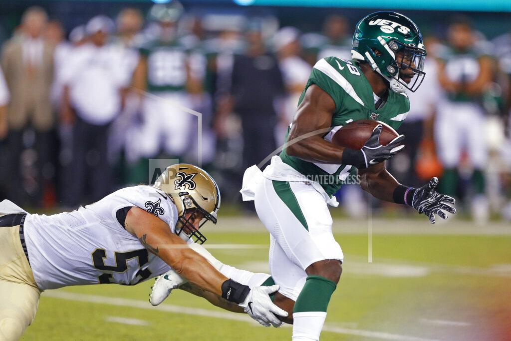 Noah K. Murray New Orleans Saints' A.J. Klein (53) dives for New York Jets' Ty Montgomery (88) during the first half of a preseason NFL football game Saturday, Aug. 24, 2019, in East Rutherford, N.J. (AP Photo/Noah K. Murray)