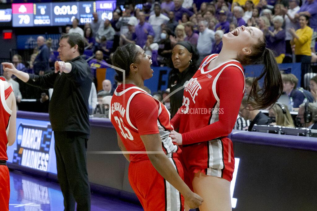 Matthew Hinton Ohio State forward Tanaya Beacham (35), left, and forward Rebeka Mikulasikova (23) celebrate their victory over LSU in a women's college basketball game in the second round of the NCAA tournament, Monday, March 21, 2022, in Baton Rouge, La. (AP Photo/Matthew Hinton)