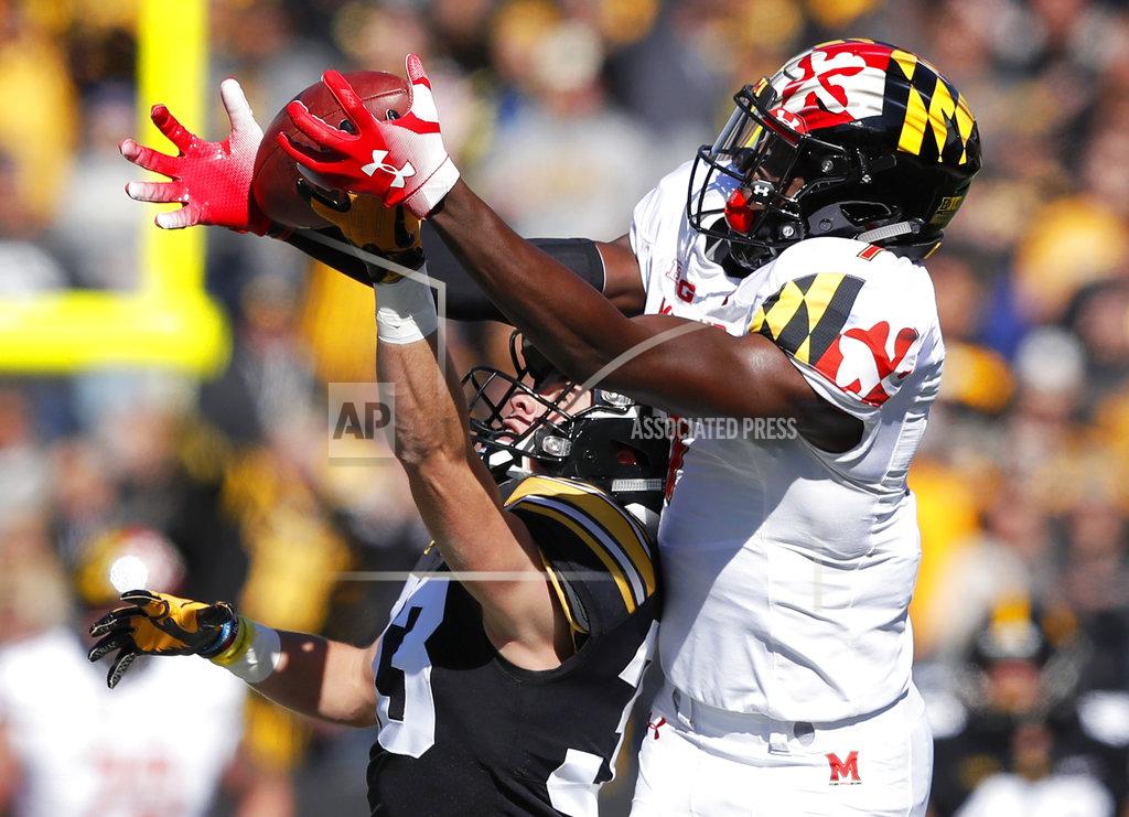 Charlie Neibergall Iowa defensive back Riley Moss, left, breaks up a pass intended for Maryland wide receiver Dontay Demus during the first half of an NCAA college football game, Saturday, Oct. 20, 2018, in Iowa City, Iowa. (AP Photo/Charlie Neibergall)