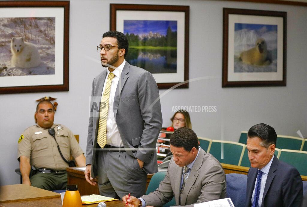 Howard Lipin FILE - In this June 14, 2019 file photo, former NFL football player Kellen Winslow Jr, standing second from left, speaks during a court hearing in Vista, Calif. Winslow pleaded guilty Monday, Nov. 4, to raping an unconscious teen and sexual battery involving a 54-year-old hitchhiker. (Howard Lipin/The San Diego Union-Tribune via AP, Pool, File)