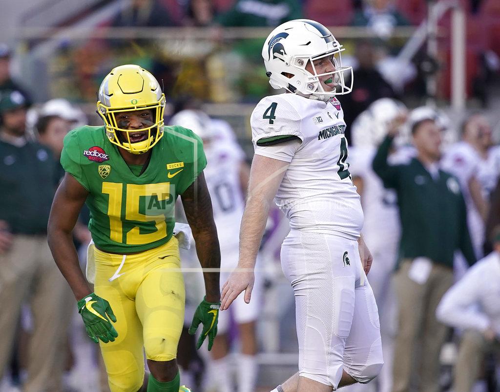 Tony Avelar Oregon's Deommodore Lenoir (15) reacts after Michigan State place-kicker Matt Coghlin (4) missed a field goal during the second half of the Redbox Bowl NCAA college football game Monday, Dec. 31, 2018, in Santa Clara, Calif. Oregon won 7-6. (AP Photo/Tony Avelar)