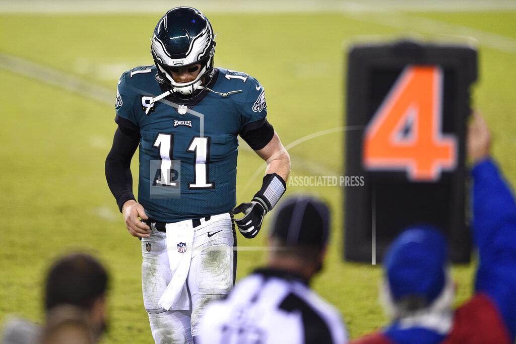 Derik Hamilton Philadelphia Eagles' Carson Wentz walks off the field during the second half of an NFL football game against the Seattle Seahawks, Monday, Nov. 30, 2020, in Philadelphia. (AP Photo/Derik Hamilton)