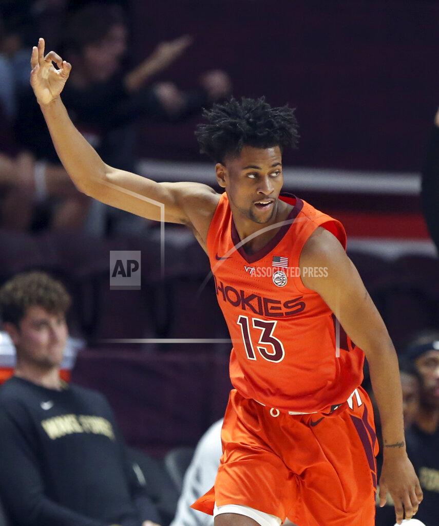 Matt Gentry Virginia Tech's Darius Maddox (13) celebrates a 3-point basket in the first half of an NCAA college basketball game against Wake Forest in Blacksburg, Va. Saturday, Dec. 4 2021. (Matt Gentry/The Roanoke Times via AP)