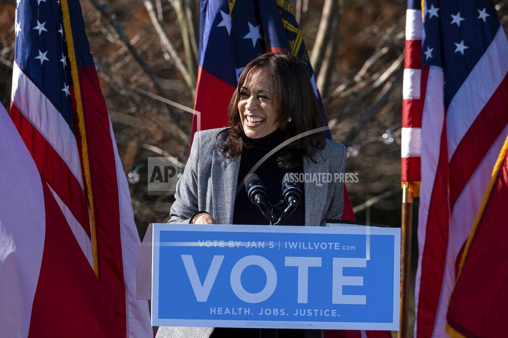 Ben Gray Vice President-Elect Kamala Harris campaigns for Democratic U.S. Senate challengers the Rev. Raphael Warnock and Jon Ossoff, Monday, Dec. 21, 2020, in Columbus, Ga. (AP Photo/Ben Gray)