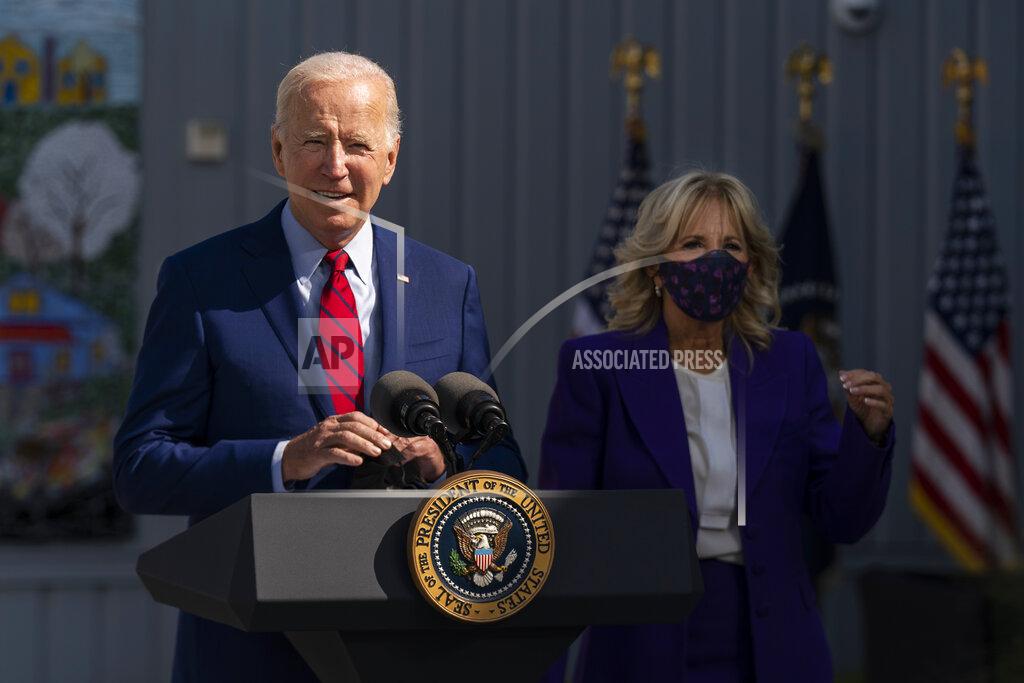 Manuel Balce Ceneta FILE - In this Sept. 10, 2021, President Joe Biden, with first lady Jill Biden, speaks during a visit at Brookland Middle School in northeast Washington. Biden has encouraged every school district to promote vaccines, including with on-site clinics, to protect students as they return to school amid a resurgence of the coronavirus. (AP Photo/Manuel Balce Ceneta, File)