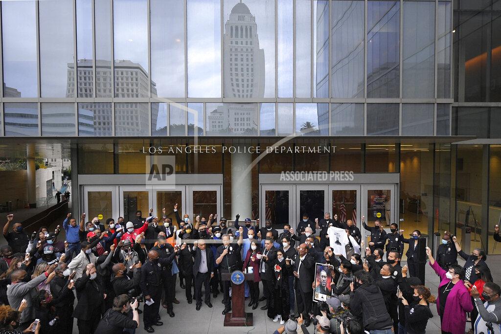 Mark J. Terrill Los Angeles police chief Michel Moore speaks during a vigil with members of professional associations and the interfaith community at Los Angeles Police Department headquarters, Friday, June 5, 2020, in Los Angeles. (AP Photo/Mark J. Terrill)