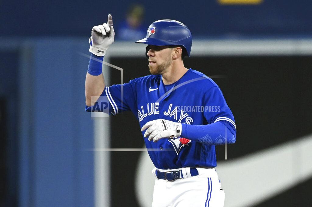 Jon Blacker Toronto Blue Jays' Bradley Zimmer gestures toward the dugout after hitting a double against the Cincinnati Reds during the fifth inning of a baseball game Friday, May 20, 2022, in Toronto. (Jon Blacker/The Canadian Press via AP)