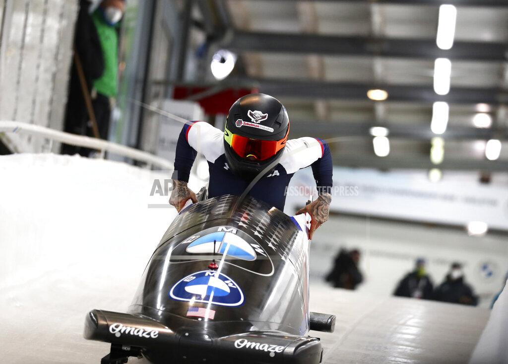 Matthias Schrader United State's bobsleigh pilot Kaillie Humphries at the start of the women's monobob race at the Bobsleigh and Skeleton World Championships in Altenberg, Germany, Saturday, Feb.13, 2021. (AP Photo/Matthias Schrader)