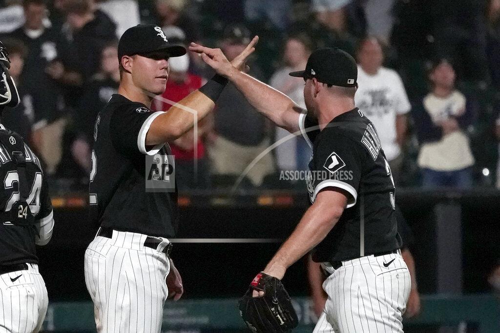 Charles Rex Arbogast Chicago White Sox's Gavin Sheets, left, and relief pitcher Liam Hendriks celebrate the team's 6-3 win over the Pittsburgh Pirates in a baseball game Wednesday, Sept. 1, 2021, in Chicago. (AP Photo/Charles Rex Arbogast)