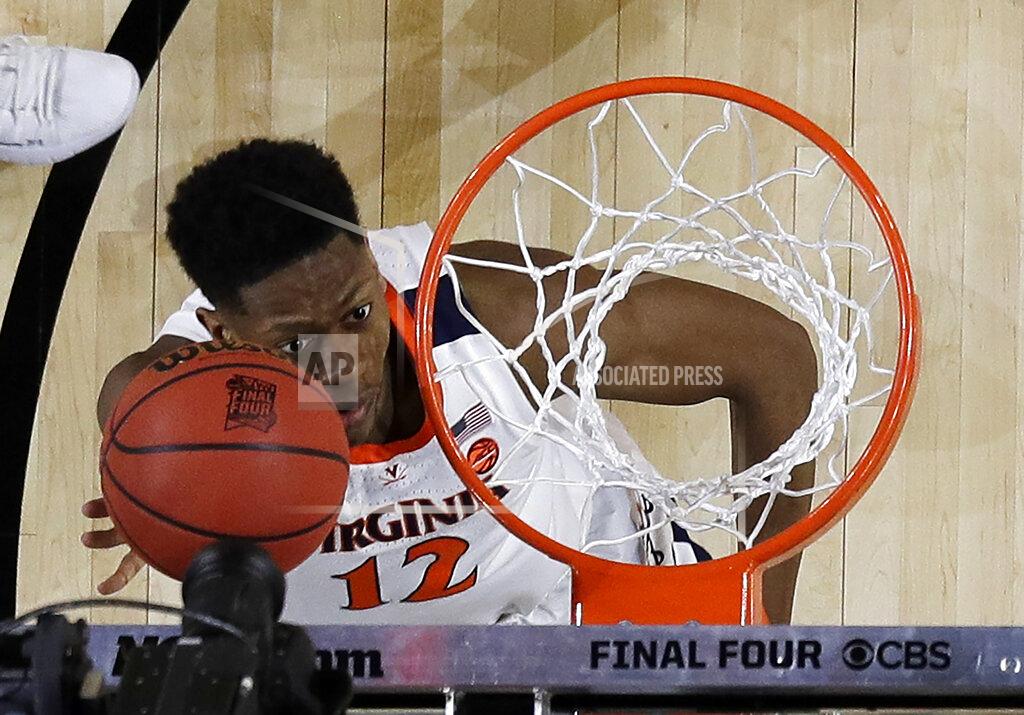Jeff Roberson Virginia's De'Andre Hunter (12) goes up for a basket during the first half in the championship of the Final Four NCAA college basketball tournament against Texas Tech, Monday, April 8, 2019, in Minneapolis. (AP Photo/Jeff Roberson)