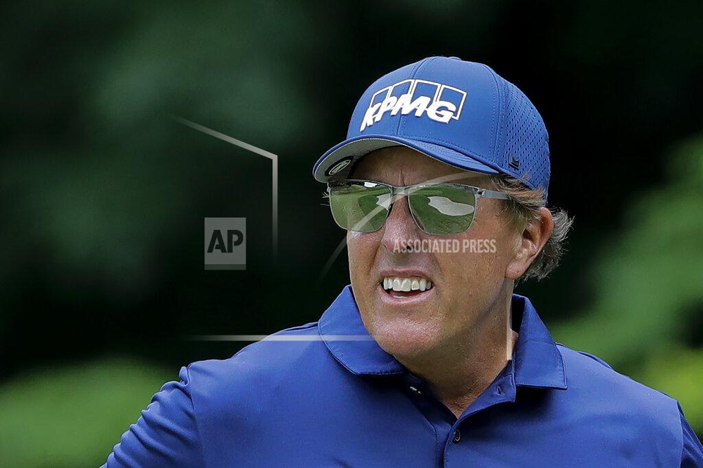Frank Franklin Ii Phil Mickelson looks on after putting on the 14th green during the second round of the Travelers Championship golf tournament at TPC River Highlands, Friday, June 26, 2020, in Cromwell, Conn. (AP Photo/Frank Franklin II)