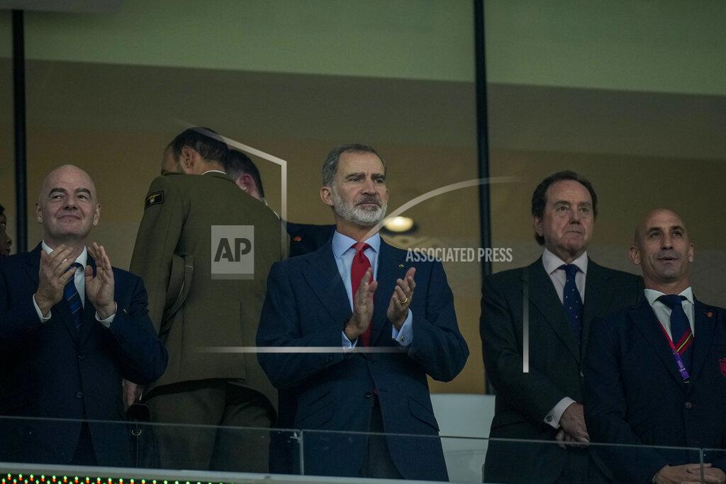Francisco Seco Spain's King Felipe VI, center, applauds next to FIFA President Gianni Infantino, left, and President of the Spanish Football Federation Luis Rubiales, right, during the World Cup group E soccer match between Spain and Costa Rica, at the Al Thumama Stadium in Doha, Qatar, Wednesday, Nov. 23, 2022. (AP Photo/Francisco Seco)
