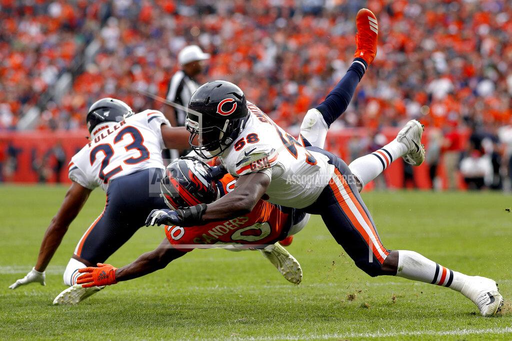 David Zalubowski Chicago Bears inside linebacker Roquan Smith (58) stops Denver Broncos wide receiver Emmanuel Sanders (10) short of the end zone during the second half of an NFL football game, Sunday, Sept. 15, 2019, in Denver. (AP Photo/David Zalubowski)