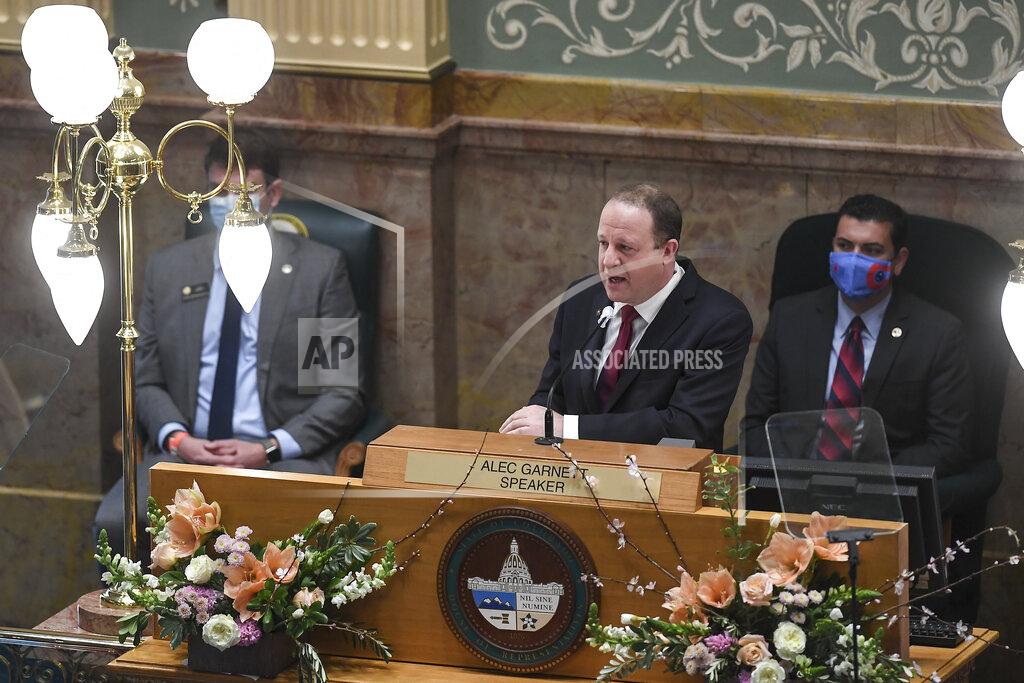 Aaron Ontiveroz Gov. Jared Polis delivers his state of the state address in front of the House of Representatives at the Colorado State Capitol Building on Wednesday, Feb. 17, 2021. Polis thanked medical professionals, educators and firefighters for their respective efforts in keeping Colorado moving forward despite the COVID-19 pandemic that has affected much of American life. (AAron Ontiveroz/The Denver Post via AP, Pool)