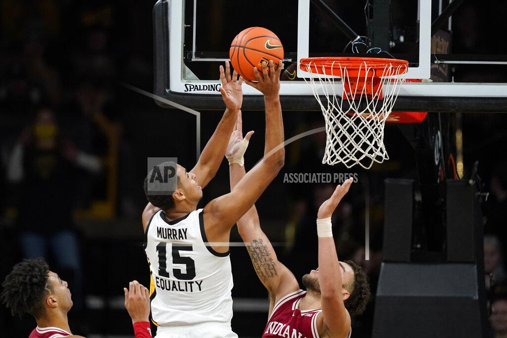 Charlie Neibergall Iowa forward Keegan Murray (15) shoots over Indiana forward Race Thompson, right, during the first half of an NCAA college basketball game, Thursday, Jan. 13, 2022, in Iowa City, Iowa. (AP Photo/Charlie Neibergall)