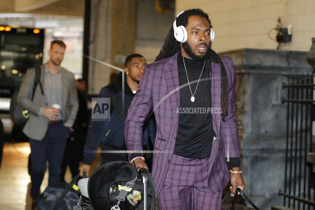 Julio Cortez San Francisco 49ers cornerback Richard Sherman arriving with his teammates for an NFL football game against Baltimore Ravens, Sunday, Dec. 1, 2019, in Baltimore, Md. (AP Photo/Julio Cortez)