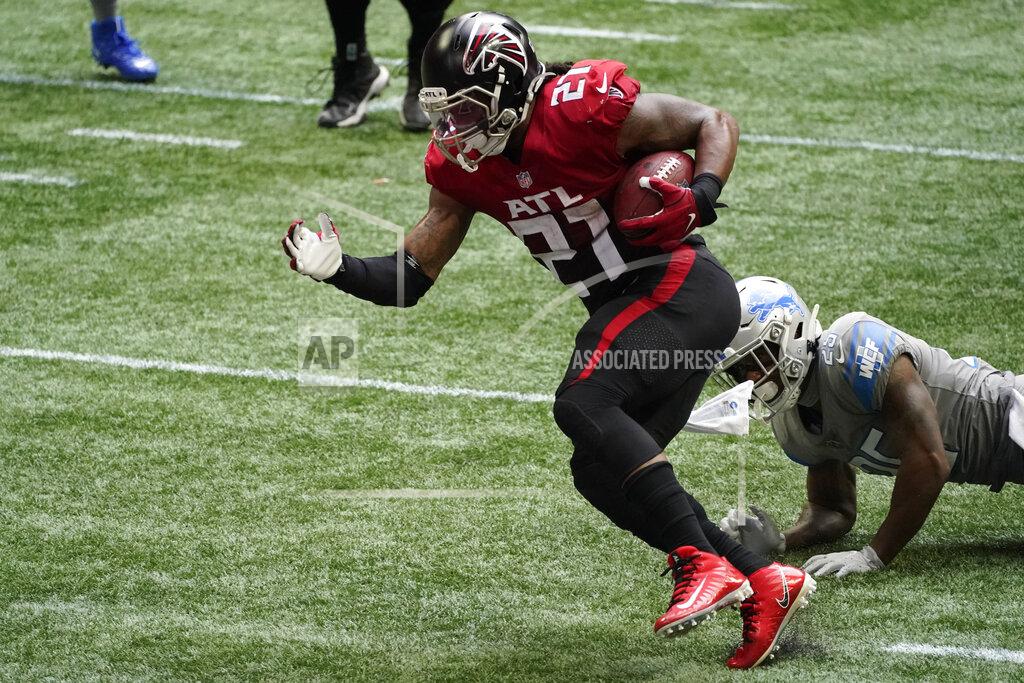 John Bazemore Atlanta Falcons running back Todd Gurley (21) runs for a touchdown against the Detroit Lions during the second half of an NFL football game, Sunday, Oct. 25, 2020, in Atlanta. (AP Photo/John Bazemore)