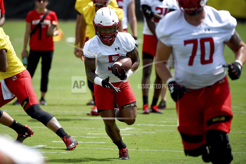 Will Newton FILE - In this Aug. 2, 2019, file photo, Maryland running back Anthony McFarland (5) works out during an NCAA college football training camp in College Park, Md. Following a miserable 2018 season, the Terrapins start anew Saturday with a home game against neighboring Howard. (AP Photo/Will Newton, File)