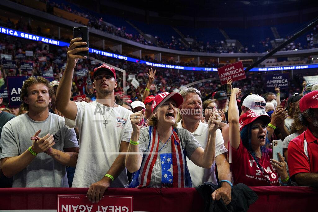 Evan Vucci President Donald Trump supporters cheer as they attend a campaign rally at the BOK Center, Saturday, June 20, 2020, in Tulsa, Okla. (AP Photo/Evan Vucci)