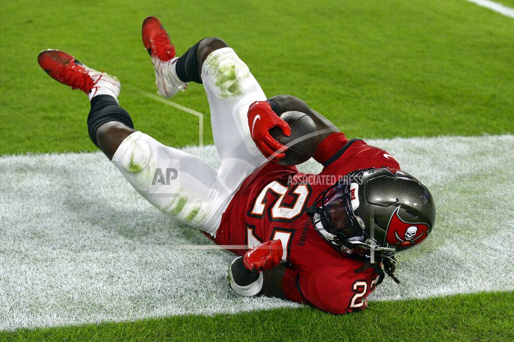 Jason Behnken Tampa Bay Buccaneers running back Ronald Jones II scores on a 6-yard touchdown run against the New York Giants during the first half of an NFL football game Monday, Nov. 22, 2021, in Tampa, Fla. (AP Photo/Jason Behnken)