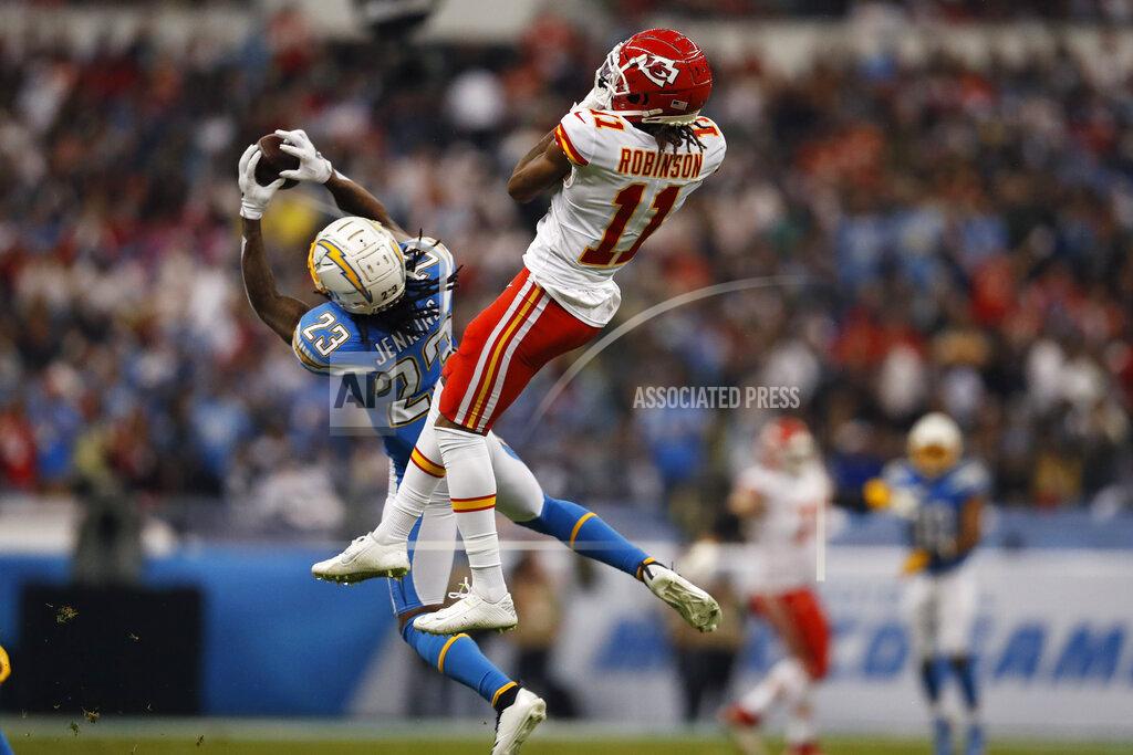 Eduardo Verdugo Los Angeles Chargers strong safety Rayshawn Jenkins (23) intercepts a pass intended for Kansas City Chiefs wide receiver Demarcus Robinson (11) during the first half of an NFL football game Monday, Nov. 18, 2019, in Mexico City. (AP Photo/Eduardo Verdugo)