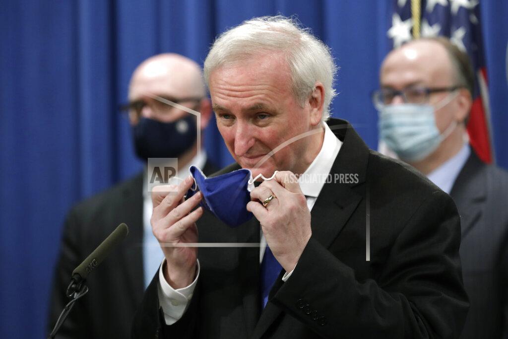 Yuri Gripas Deputy Attorney General Jeffrey A. Rosen removes his face mask to speak during a news conference to announce the results of the global resolution of criminal and civil investigations with an opioid manufacturer at the Justice Department in Washington, Wednesday, Oct. 21, 2020. (Yuri Gripas/Pool via AP)