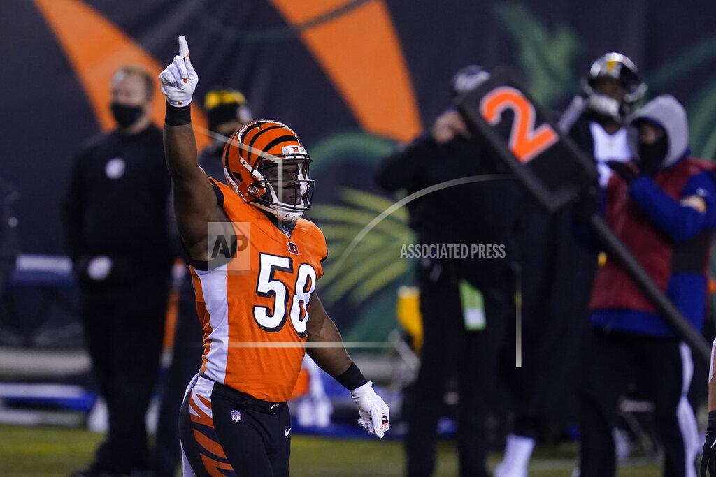Michael Conroy Cincinnati Bengals' Carl Lawson (58) reacts after sacking Pittsburgh Steelers quarterback Ben Roethlisberger during the first half of an NFL football game, Monday, Dec. 21, 2020, in Cincinnati. (AP Photo/Michael Conroy)