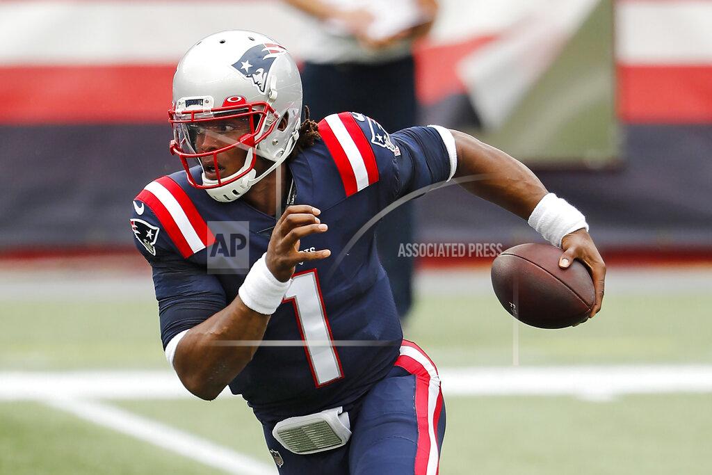 Winslow Townson FILE - In this Sunday, Sept. 27, 2020, file photo, New England Patriots quarterback Cam Newton runs against the Las Vegas Raiders during an NFL football game at Gillette Stadium, in Foxborough, Mass. Former Patriots quarterback Jimmy Garoppolo will lead the San Francisco 49ers against the Patriots on Sunday, Oct. 25. (AP Photo/Winslow Townson, File)