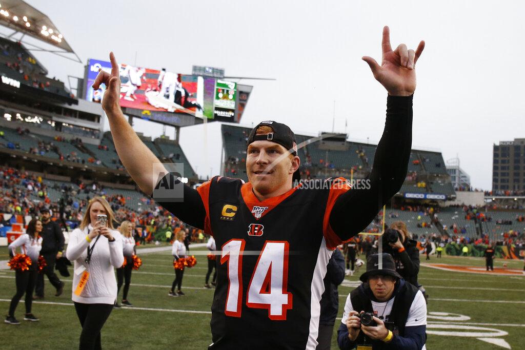 Gary Landers Cincinnati Bengals quarterback Andy Dalton celebrates after the Bengals defeated the Cleveland Browns 33-23 in an NFL football game, Sunday, Dec. 29, 2019, in Cincinnati. (AP Photo/Gary Landers)