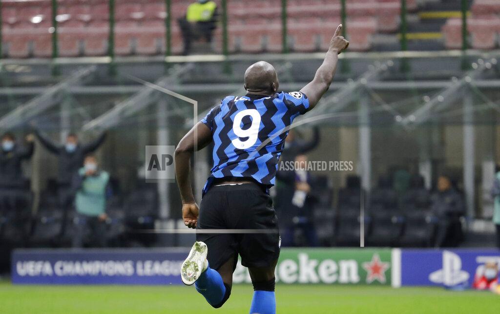 Luca Bruno Inter Milan's Romelu Lukaku celebrates after scoring his side's opening goal during the Champions League group B soccer match between Inter Milan and Borussia Moenchangladbach at the San Siro stadium in Milan, Italy, Wednesday, Oct. 21, 2020. (AP Photo/Luca Bruno)