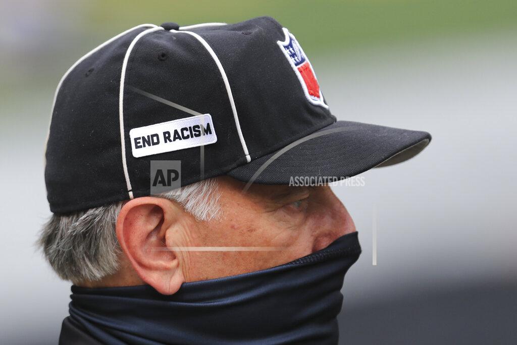 Aaron Doster Field judge Mike Weatherford watches as the Cincinnati Bengals and Los Angeles Chargers warm up before an NFL football game, Sunday, Sept. 13, 2020, in Cincinnati. (AP Photo/Aaron Doster)