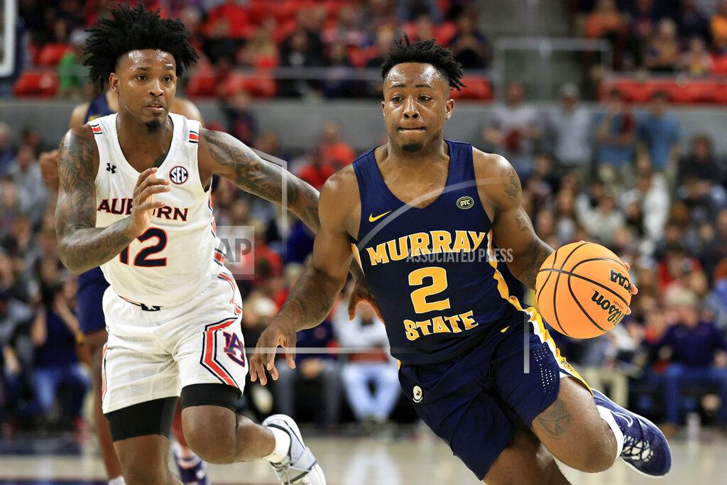 Butch Dill Murray State guard Trae Hannibal (2) drives to the basket around Auburn guard Zep Jasper (12) during the first half of an NCAA college basketball game Wednesday, Dec. 22, 2021, in Auburn, Ala. (AP Photo/Butch Dill)