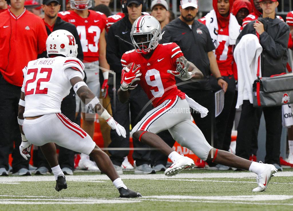 Jay Laprete Ohio State receiver Binjimen Victor, right, tries to avoid Rutgers defensive back Damon Hayes during the second half of an NCAA college football game Saturday, Sept. 8, 2018, in Columbus, Ohio. Ohio State beat Rutgers 52-3. (AP Photo/Jay LaPrete)