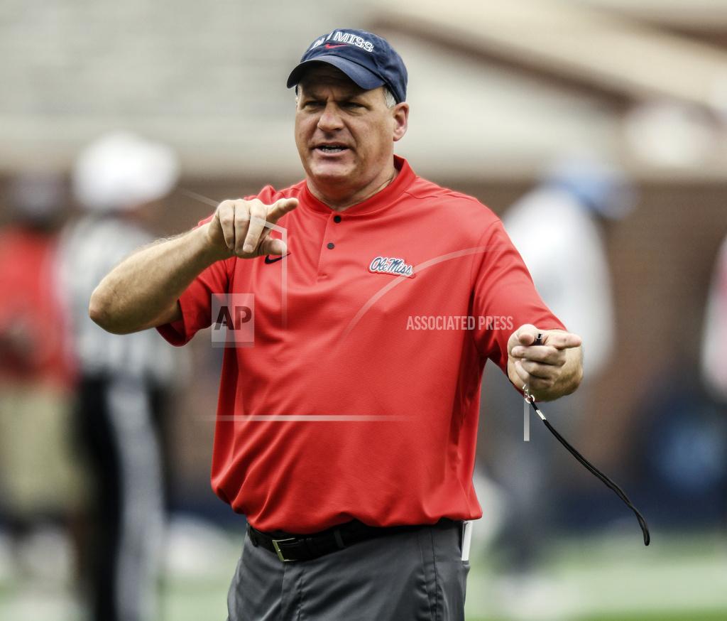 Bruce Newman FILE - In this April 6, 2019, file photo, Mississippi offensive coordinator Rich Rodriguez gestures before the Grove Bowl spring NCAA college football game in Oxford, Miss. The list of new SEC coordinators this year includes three former Power Five head coaches, including Rich Rodriguez (West Virginia, Michigan and Arizona).(Bruce Newman/The Oxford Eagle via AP, File)