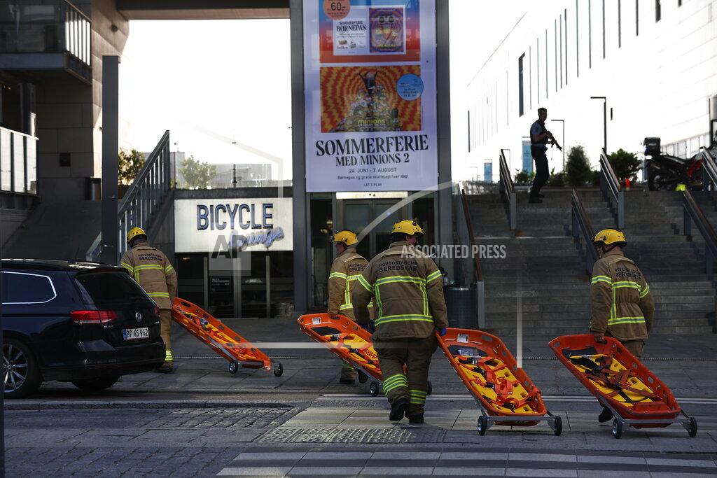 Olafur Steinar Gestsson Emergency services at the Field's shopping center after a shooting, in Copenhagen, Denmark, Sunday July 3, 2022. Danish police say several people have been shot at a Copenhagen shopping mall. Copenhagen police said that one person has been arrested in connection with the shooting at the Field’s shopping mall on Sunday. Police tweeted that “several people have been hit” but gave no other details. (Olafur Steinar Gestsson/Ritzau Scanpix via AP)