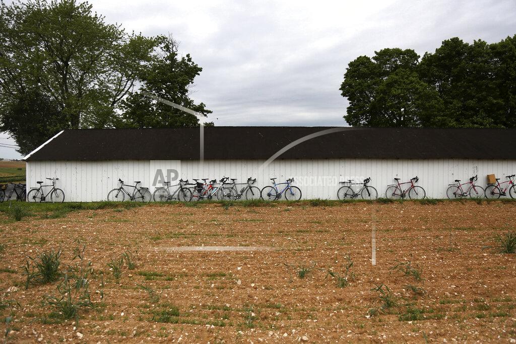 Jessie Wardarski In this Sunday, May 17, 2020, photo, bicycles line the side of a shed near the Old Order Stauffer Mennonite Church as in-person service resumes for the first time in nearly two months, in New Holland, Pa. (AP Photo/Jessie Wardarski)