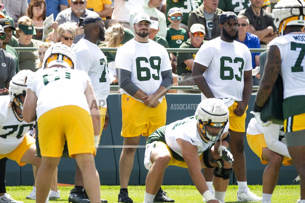 Samantha Madar Green Bay Packers tackle David Bakhtiari (69) watches his teammates during NFL football training camp on Thursday, July 28, 2022, at Ray Nitschke Field in Ashwaubenon, Wis. (Samantha Madar/The Post-Crescent via AP)