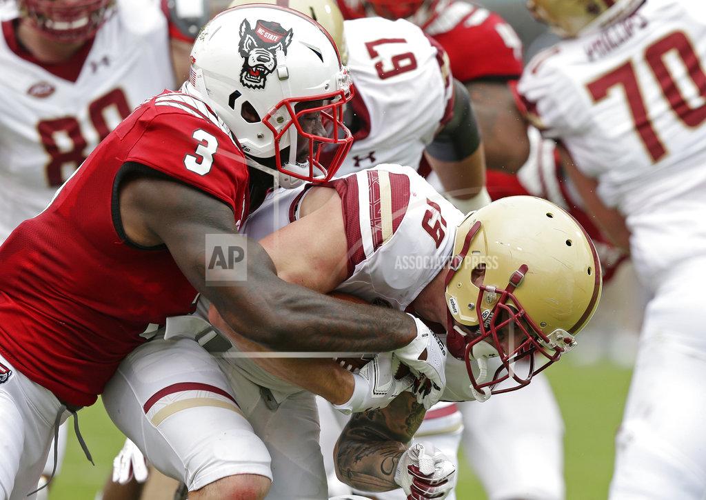 Gerry Broome North Carolina State's Germaine Pratt (3) tackles Boston College's Ben Glines (19) during the first half an NCAA college football game in Raleigh, N.C., Saturday, Oct. 6, 2018. (AP Photo/Gerry Broome)