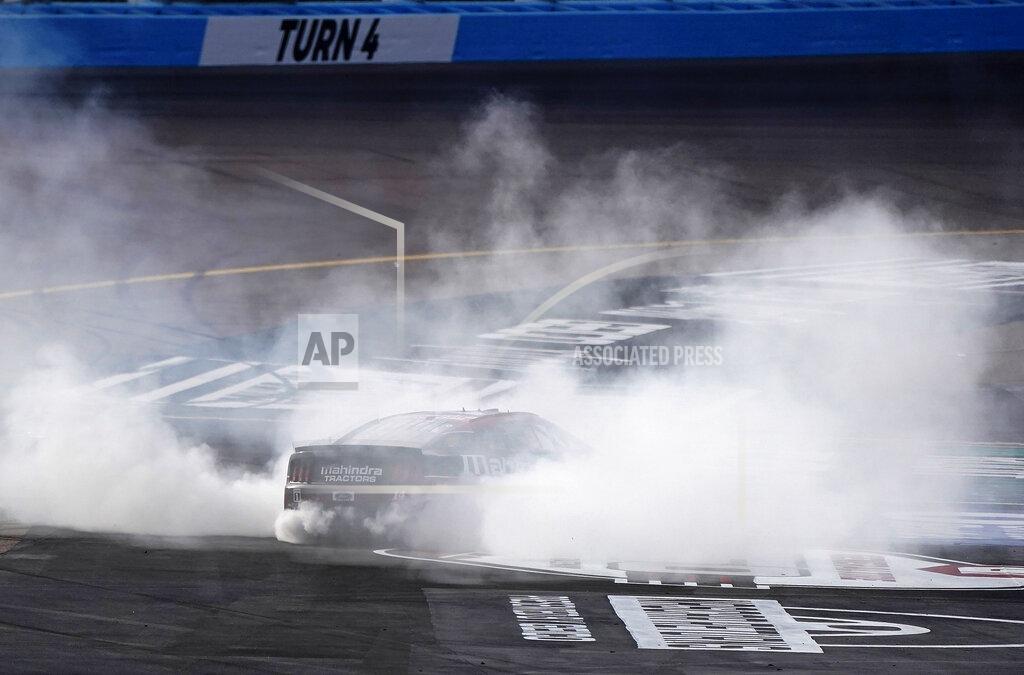 Darryl Webb Chase Briscoe spins out after winning a NASCAR Cup Series auto race at Phoenix Raceway, Sunday, March 13, 2022, in Avondale, Ariz. (AP Photo/Darryl Webb)