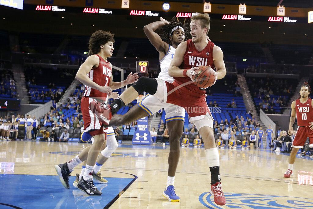 Marcio Jose Sanchez Washington State forward Jeff Pollard grabs a rebound against UCLA during the first half of an NCAA college basketball game Thursday, Feb. 13, 2020, in Los Angeles. (AP Photo/Marcio Jose Sanchez)