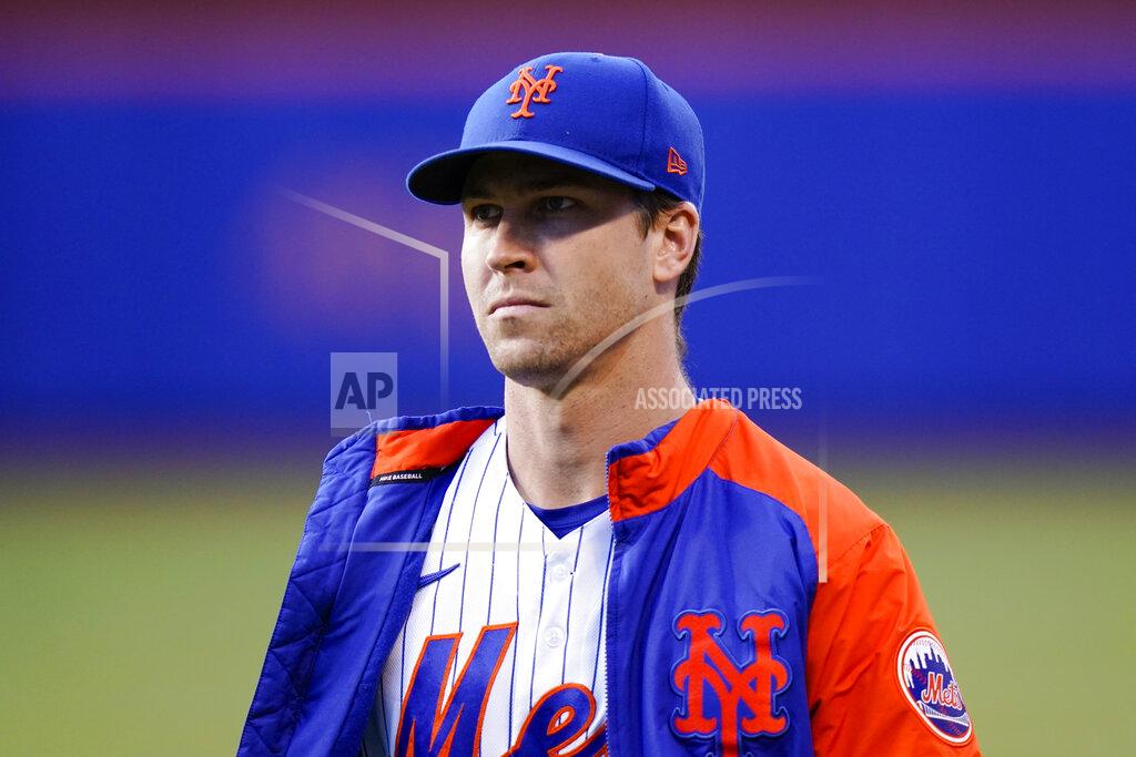 Frank Franklin Ii New York Mets starting pitcher Jacob deGrom walks on the field before a baseball game against the Chicago Cubs Wednesday, June 16, 2021, in New York. (AP Photo/Frank Franklin II)