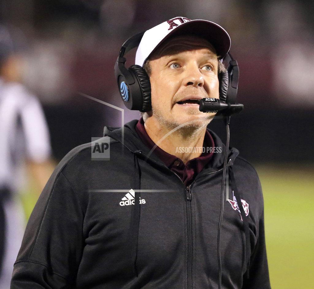Jim Lytle Texas A&M head coach Jimbo Fisher watches a replay on the video board during the second half of their NCAA college football game against Mississippi State on Saturday, Oct. 27, 2018, in Starkville, Miss. (AP Photo/Jim Lytle)