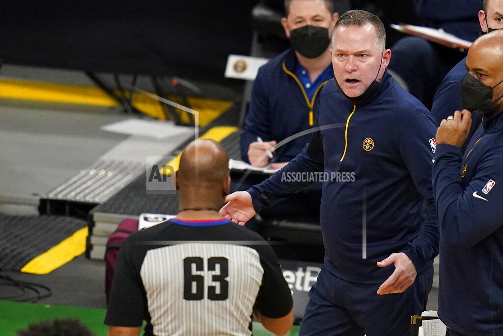Charles Krupa Denver Nuggets head coach Michael Malone argues with referee Derek Richardson (63) after receiving a technical foul during the first half ofn an NBA basketball game against the Boston Celtics, Tuesday, Feb. 16, 2021, in Boston. (AP Photo/Charles Krupa)