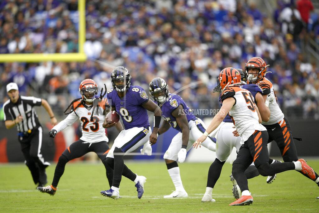 Nick Wass Baltimore Ravens quarterback Lamar Jackson (8) scrambles against the Cincinnati Bengals during the second half of a NFL football game Sunday, Oct. 13, 2019, in Baltimore. (AP Photo/Nick Wass)