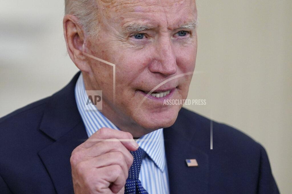 Evan Vucci President Joe Biden speaks about the COVID-19 vaccination program, in the State Dining Room of the White House, Tuesday, May 4, 2021, in Washington. (AP Photo/Evan Vucci)