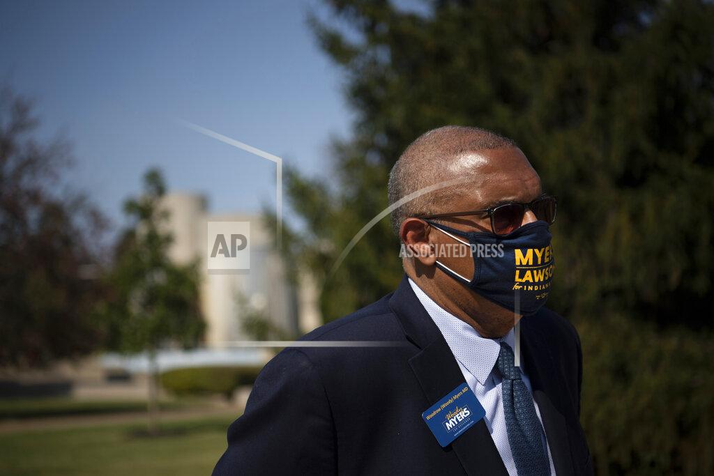 Dr. Woody Myers, Democratic candidate for Indiana governor, speaks at an early voting rally across the street from the Old National Events Plaza in Evansville, Ind., Tuesday morning, Oct. 6, 2020. (Denny Simmons/Evansville Courier & Press via AP)