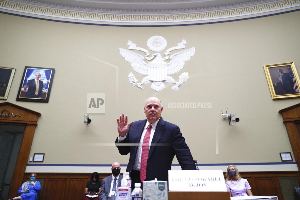 Tom Brenner Postmaster General Louis DeJoy is sworn in before testifying before a House Oversight and Reform Committee hearing on the Postal Service on Capitol Hill, Monday, Aug. 24, 2020, in Washington. (Tom Brenner/Pool via AP)